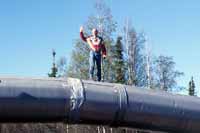 Eric standing on the pipeline